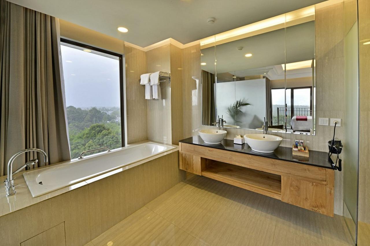 Famvida Hotel Lubuklinggau Kamer foto