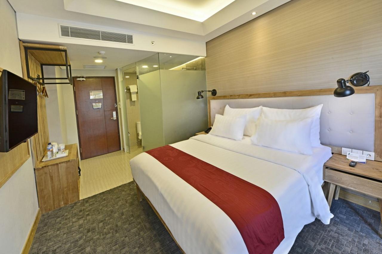 Famvida Hotel Lubuklinggau Buitenkant foto