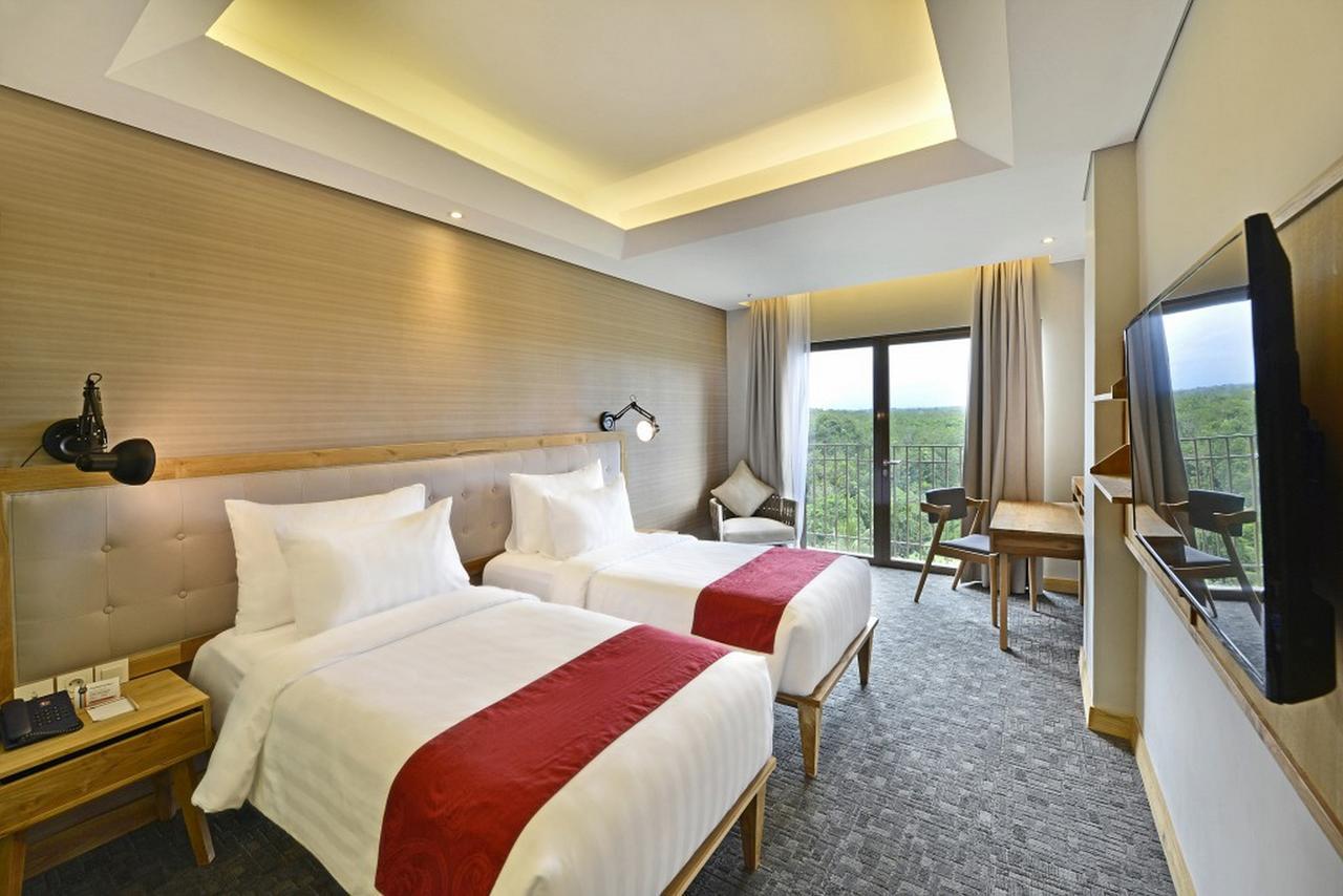 Famvida Hotel Lubuklinggau Buitenkant foto