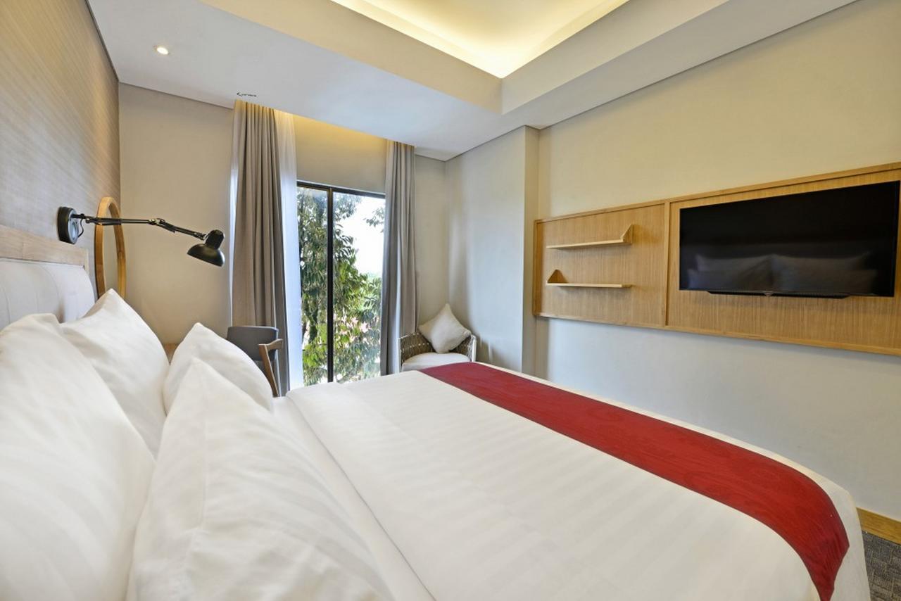 Famvida Hotel Lubuklinggau Buitenkant foto